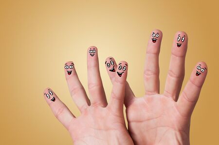Happy face fingers hug each otherの写真素材
