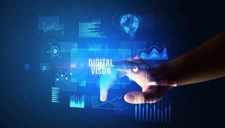 Hand touching DIGITAL VISON inscription, new business technology conceptの写真素材