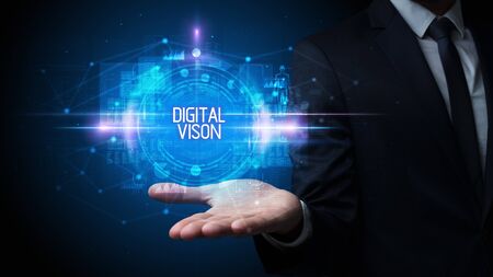 Man hand holding DIGITAL VISON inscription, technology conceptの写真素材