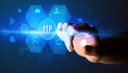 Hand touching FTP inscription, new technology conceptの写真素材