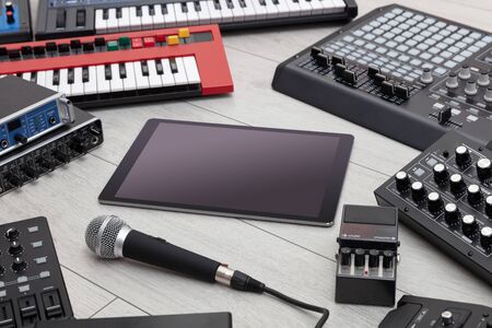 Empty tablet and electronic music instrumentsの写真素材