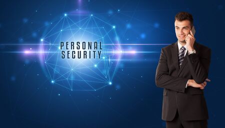 Businessman thinking about security solutions with PERSONAL SECURITY inscriptionの写真素材
