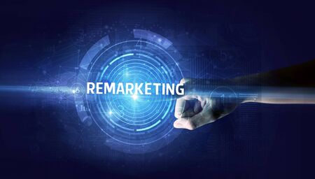 Hand touching REMARKETING  button, modern business technology concept の写真素材