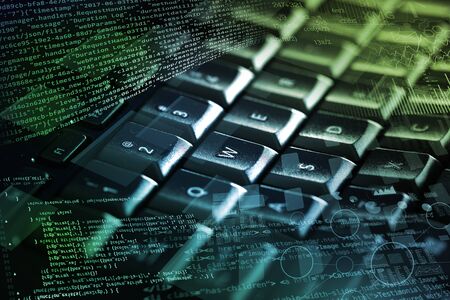 Close-up dark keyboard with coding and programing conceptの写真素材