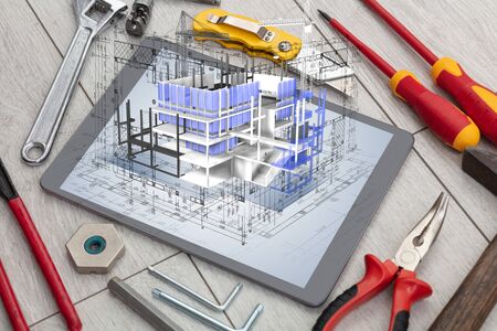 Tablet with construction tools and 3d house plan concept
の写真素材