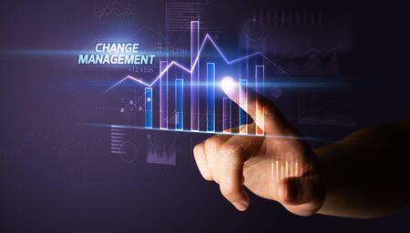 Hand touching CHANGE MANAGEMENT button, business conceptの写真素材