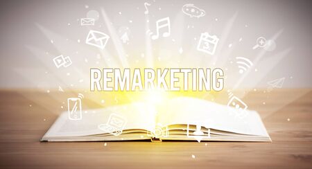 Opeen book with REMARKETING inscription, business conceptの写真素材
