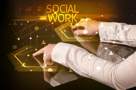 Navigating social networking with SOCIAL WORK inscription, new media conceptの写真素材