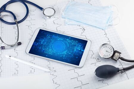 Close-up view of a tablet pc with abbreviation, medical conceptの写真素材