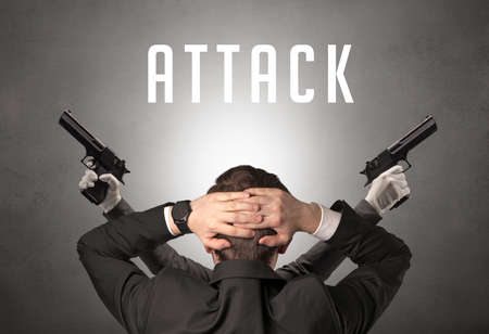 Rear view of a businessman with ATTACK inscription, cyber security conceptの写真素材
