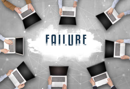 Group of people having a meeting with FAILURE insciption, web security conceptの写真素材