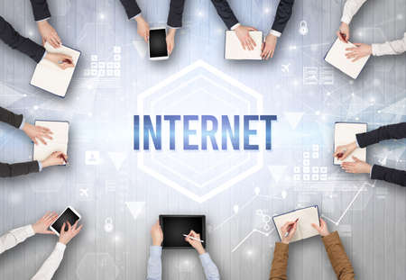 Group of Busy People Working in an Office with INTERNET inscription, modern technology conceptの写真素材