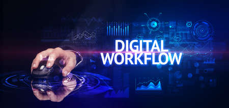 hand holding wireless peripheral with DIGITAL WORKFLOW inscription, modern technology concept