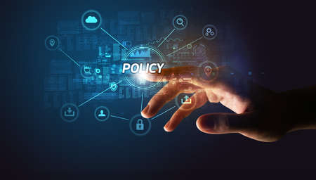 Hand touching POLICY inscription, Cybersecurity conceptの写真素材
