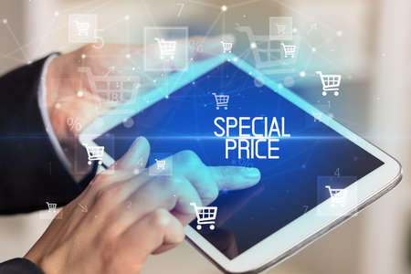 Young person makes a purchase through online shopping application with SPECIAL PRICE inscription