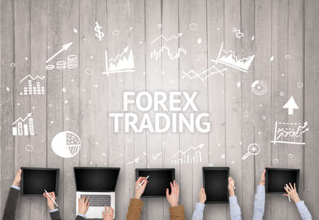 Group of Busy People Working in an Office with FOREX TRADING inscription, succesfull business conceptの写真素材