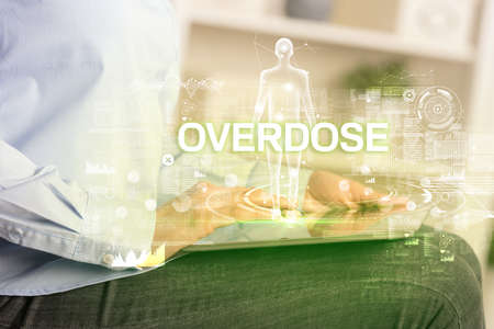 Electronic medical record with OVERDOSE inscription, Medical technology conceptの写真素材