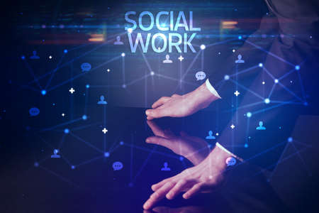 Navigating social networking with SOCIAL WORK inscription, new media conceptの写真素材