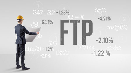 Technology Engineer in hard hat with FTP abbreviationの写真素材