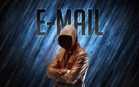 Mysterious man with E-MAIL inscription, online security conceptの写真素材