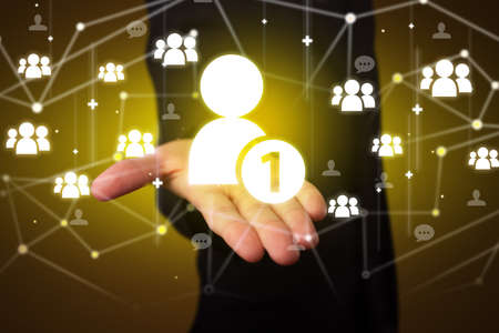 Hand holdig friend request icon around his hands, Social networking conceptの写真素材