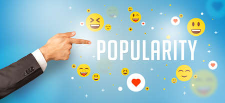 Close-Up of cropped hand pointing at social media conceptの写真素材