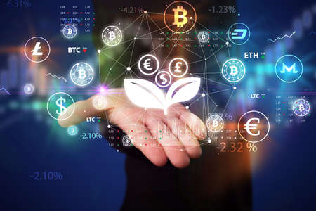 Businessman holding currency symbols