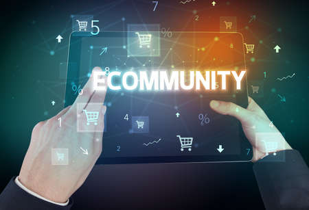 Close-up of a hand holding tablet with shopping inscriptionの写真素材