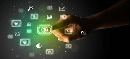 Businessman finger touching on screen multimedia interface with hand drawn currency iconsの写真素材
