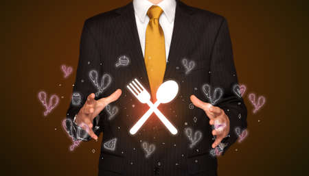 Hand holding food related iconsの写真素材