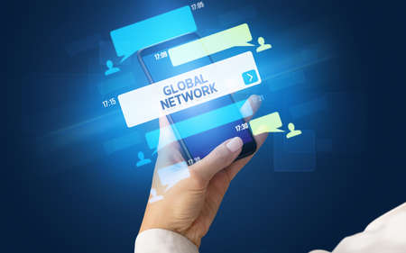 Hand using smartphone with social media concept. GLOBAL NETWORK