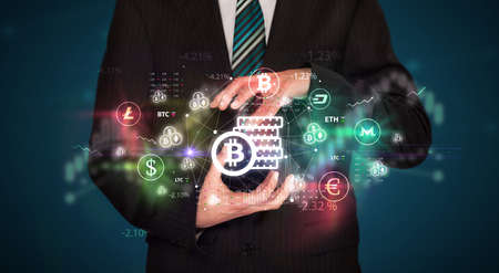 Businessman holding currency symbols concept