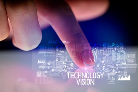 Finger touching tablet with web technology icons conceptの写真素材