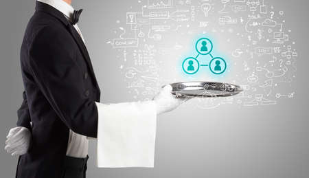 Close-up of waiter serving social media icons