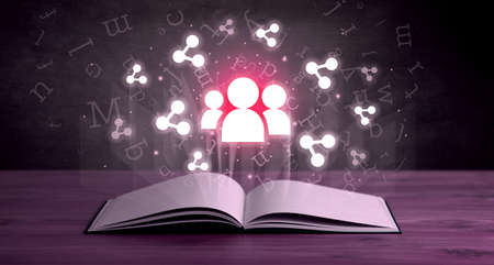 Open book with social networking icons above