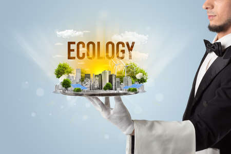 Waiter serving eco cityscape conceptの写真素材