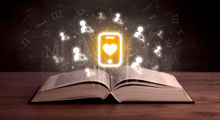 Open book with social networking icons above