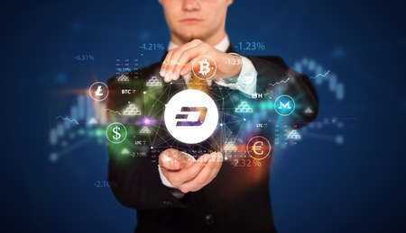 Businessman holding currency symbols concept