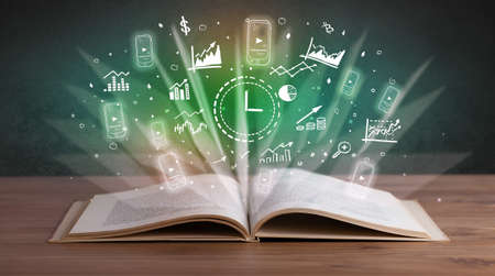 Open book with profit icons aboveの写真素材