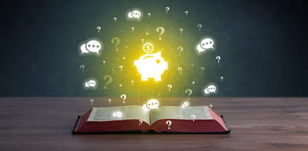 Open book with business icons above