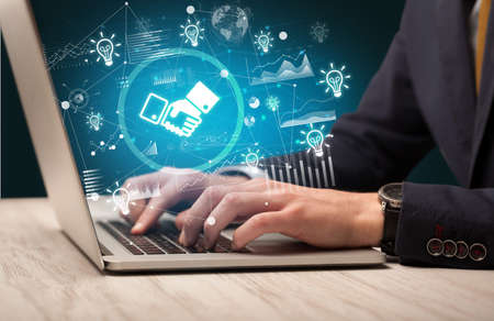 Business hand working on laptop, successful business conceptの写真素材