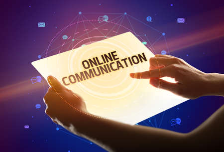 holding futuristic tablet, social media conceptの写真素材