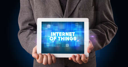 Person holding tablet, technology conceptの写真素材