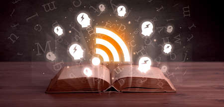 Open book with social networking icons above