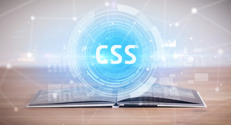 Open book with CSS abbreviation, modern technology conceptの写真素材