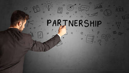 businessman drawing a creative idea sketchの写真素材