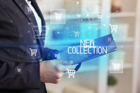 Young person makes a purchase through a tabletの写真素材