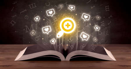 Open book with social networking icons above