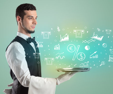 Handsome young waiter in tuxedo holding money icons on trayの写真素材