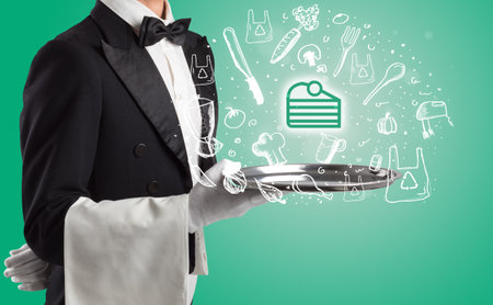 Waiter holding silver tray with food icons aboveの写真素材
